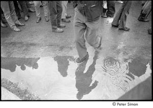 MIT war research demonstration: man stepping in a puddle