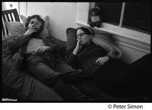 smoking a cigarette before bed Students reclining on a bed, smoking cigarettes
