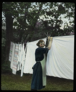 The Jensen garden at Ravinia (woman hanging out wash)