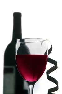 Wine glass and bottle (studio shot)