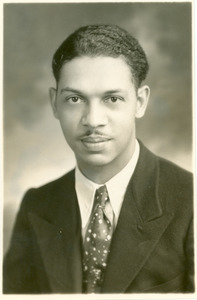 Unidentified African American man in suit jacket and tie
