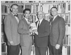 Hugh Montgomery and Mack Drake with two unidentified men in Goodell addition