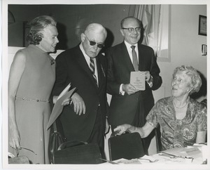 Mrs. William S. Kilbourne, Mr. Hermann G. Place, Dr. Salvatore G. DiMichael and Mrs. Frank Russell at Thanksgiving celebration