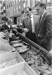 Mayor Raymond L. Flynn and Representative Salvatore DiMasi at a North End fishmonger