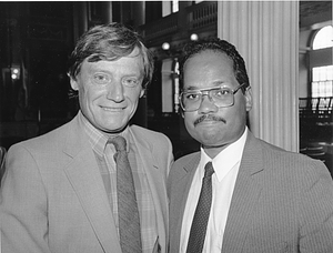 Boston City Councilor Charles Yancey posing with an unidentified man