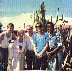 A Photograph of Marsha P. Johnson Posing in Front of Cacti with Willie Brashears, Randy Wicker, and George Flimlin