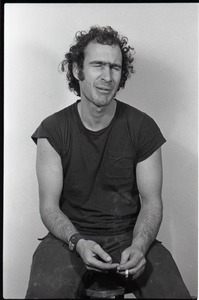 Studio portrait of Richard Safft, seated on a stool