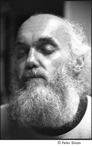 Ram Dass lecture in Boston: close-up of Ram Dass with his eyes closed