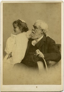 Justin Winsor and his grandchild [Penelope Barker Noyes]: three-quarter length studio portrait with your girl on her grandfather's lap