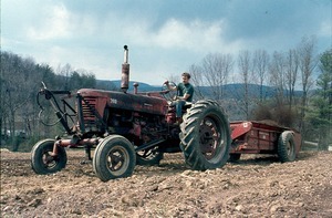 Tilling the land with Bill Stone on tractor