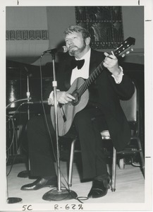 Man with guitar singing
