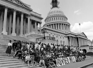 Group of visitors from Powder Mill school, posed on the steps of the United States Capitol building