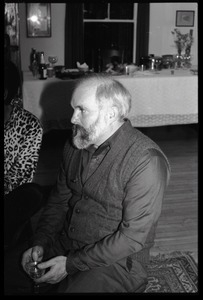 Robert H. Abel, informal portrait seated and in conversation, at the book party for Robert H. Abel