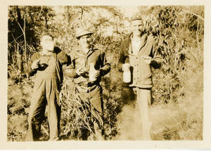 Leon M. Smith holding a bottle