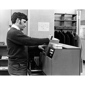 Larry Gula operating an IBM 1130