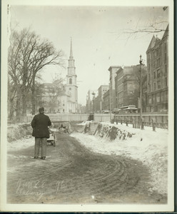 Subway construction on Tremont St., Boston, Mass., with unidentified man in foreground facing Park St. Church