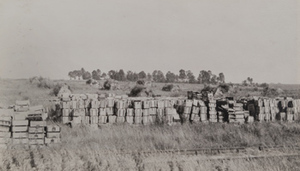 Stacks of ammunition boxes in a field, Soissons
