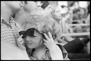 Young girl with dark sunglasses, before Taj Mahal concert, Newport Folk Festival