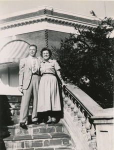 Abraham Ozer and Ruth Newman, posing on steps