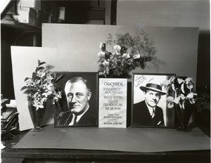 Orchids to President Roosevelt and Walter Winchell: portraits of Roosevelt and Winchell with orchid display (Dendrobium sp. and Cattleya labiata, l. to r.)