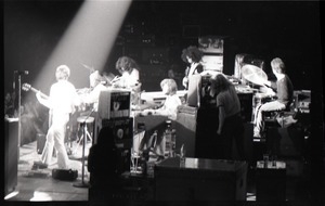 Santana concert at the Springfield Civic Center: view of band from behind bank of audio equipment