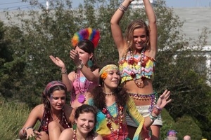 Parade marchers, dressed in beads and bright colors : Provincetown Carnival parade