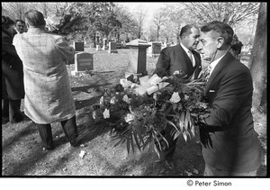 Jack Kerouac's funeral: man carrying wreath at the cemetery