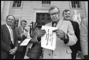 Distributing literature protesting the invasion of Laos on the steps of the Vermont State House