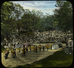 Outdoor pageant with children dressed as butterflies