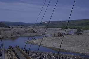 Placer gold dredge flume