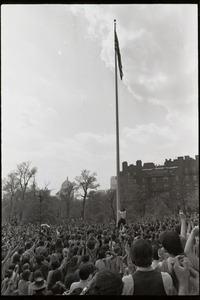 Demonstration at State House against the killings at Kent State: protesters surrounding and attempting to lower the American flag