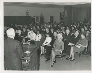 Hermann G. Place addressing Christmas play audience