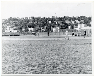 Unidentified men playing baseball