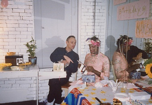 Photographs of Marsha P. Johnson at Her Birthday Party, Opening Presents with a Friend
