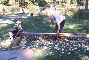 Hopkins Forest Fall Festival, 1999. 6. Richard Babcock measures the trueness of a beam.