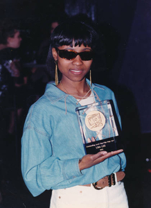 Lisa Lee having received second Boston Music Award