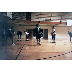 Young men playing basketball.