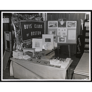 Art exhibits in the "Boys' Clubs of Boston booth at Do-It-Yourself Show at Mechanics Building, Boston Nov. 25, 1957"