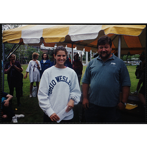 A woman and a man pose together at the Battle of Bunker Hill Road Race