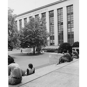 Students lounging around Krentzman Quadrangle