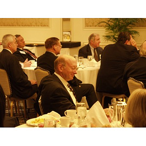 Audience members listen to Bruce Nelson at the College of Business Administration's CEO Breakfast