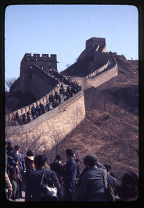 On Great Wall, crowd in foreground, two watchtowers