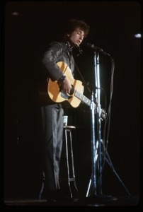 Bob Dylan performing on stage