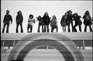 Free Spirit Press crew on top of their bus: view from the side of the bus