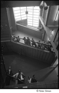 MIT war research demonstration: onlookers watching demonstrators march through the campus administration building