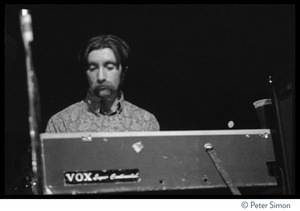 Tom Constanten playing keyboards during Grateful Dead concert at the Ark