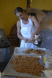 Hungry Ghost Bread: owner and baker, Jonathan C. Stevens, preparing filling for cinnamon rolls