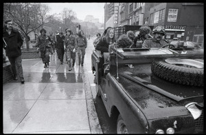 Vietnam Veterans Against the War demonstration 'Search and destroy': veterans riding in jeep along Tremont Street