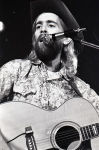 New Riders of the Purple Sage opening for the Grateful Dead at Sargent Gym, Boston University: John 'Marmaduke' Dawson playing acoustic guitar and singing