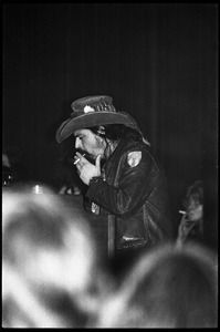 Grateful Dead performing at the Music Hall: Ron 'pigpen' McKernan smoking a cigarette onstage